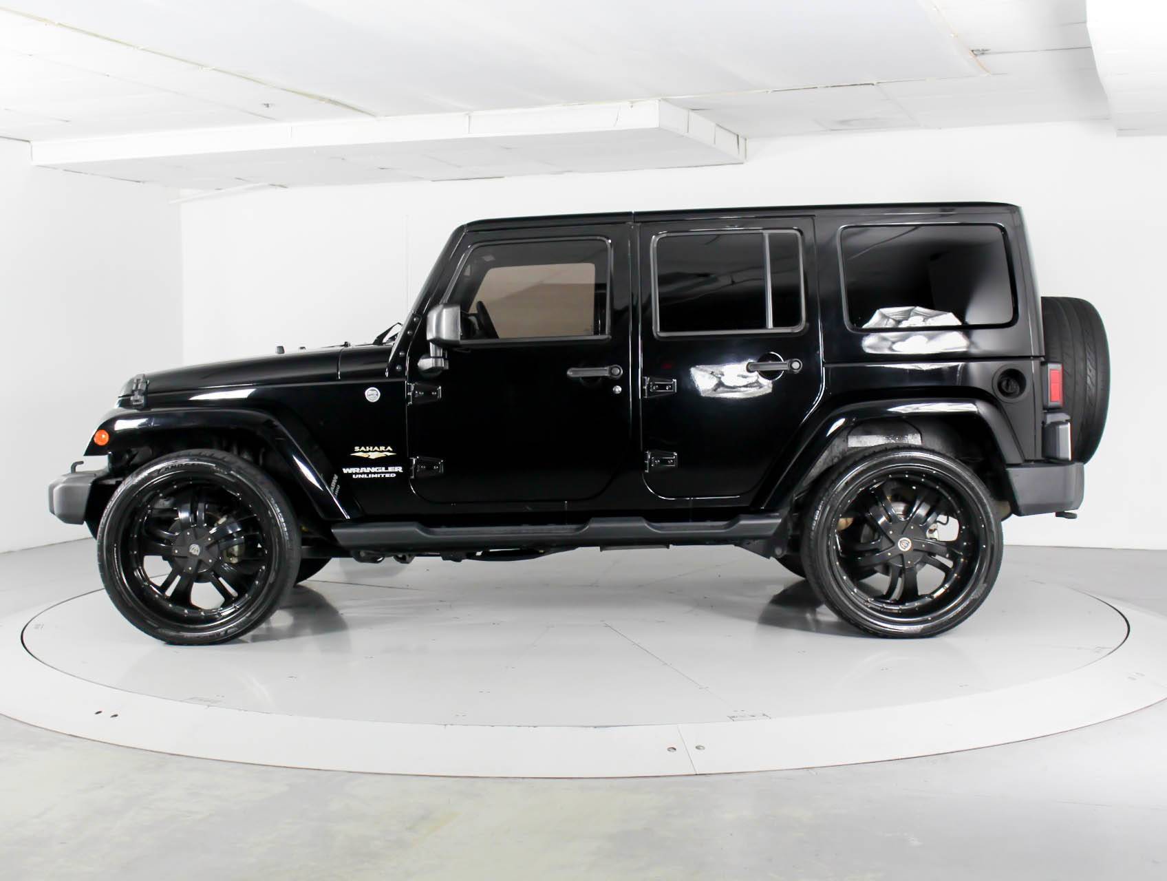 Florida Fine Cars - Used JEEP WRANGLER UNLIMITED 2015 WEST PALM SAHARA