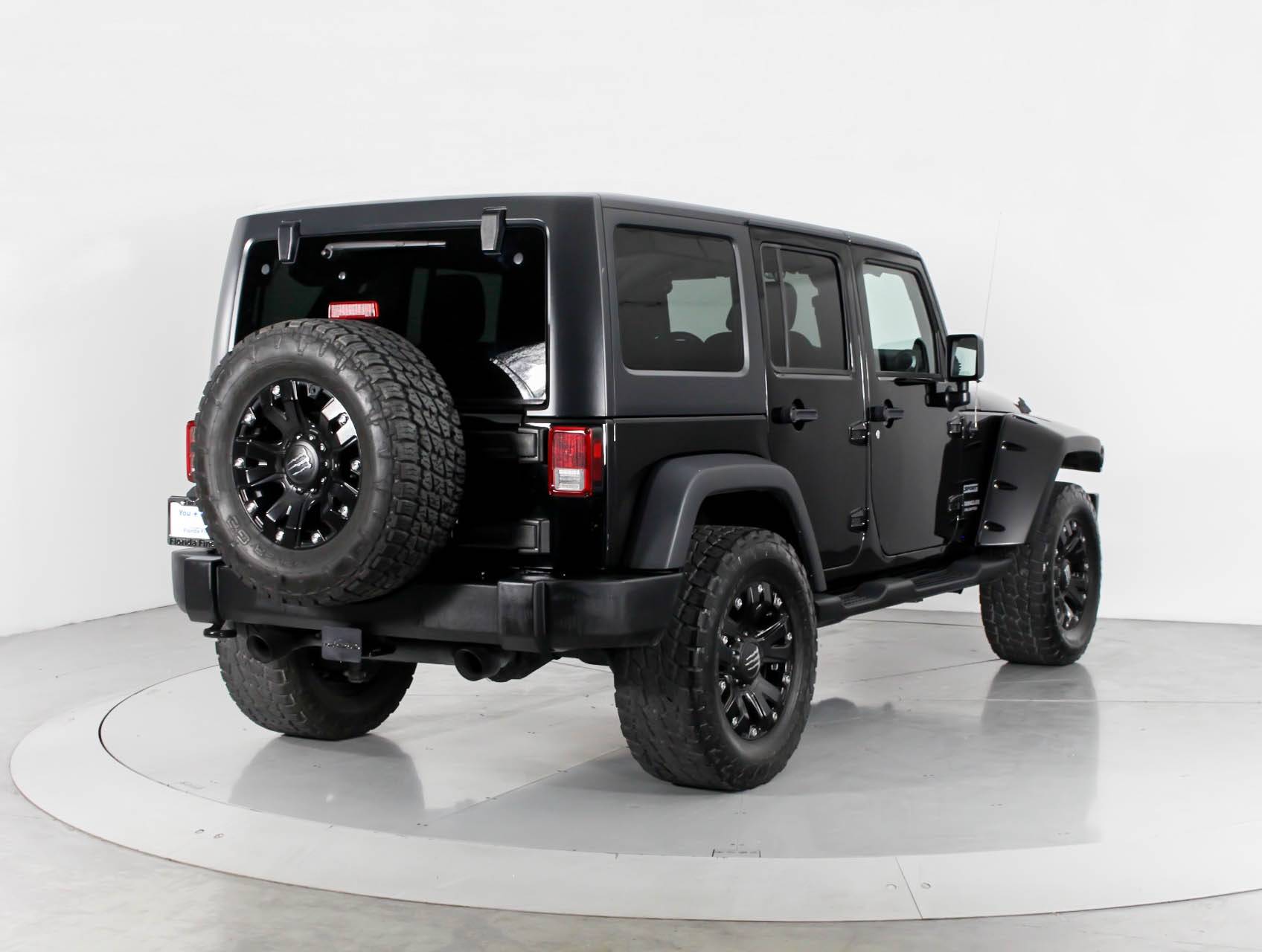 Florida Fine Cars - Used JEEP WRANGLER UNLIMITED 2013 WEST PALM SPORT