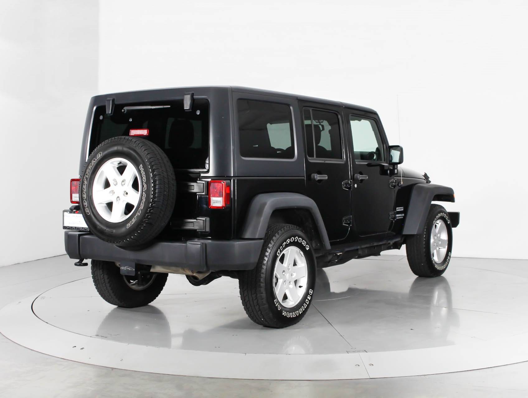 Florida Fine Cars - Used JEEP WRANGLER UNLIMITED 2014 WEST PALM SPORT