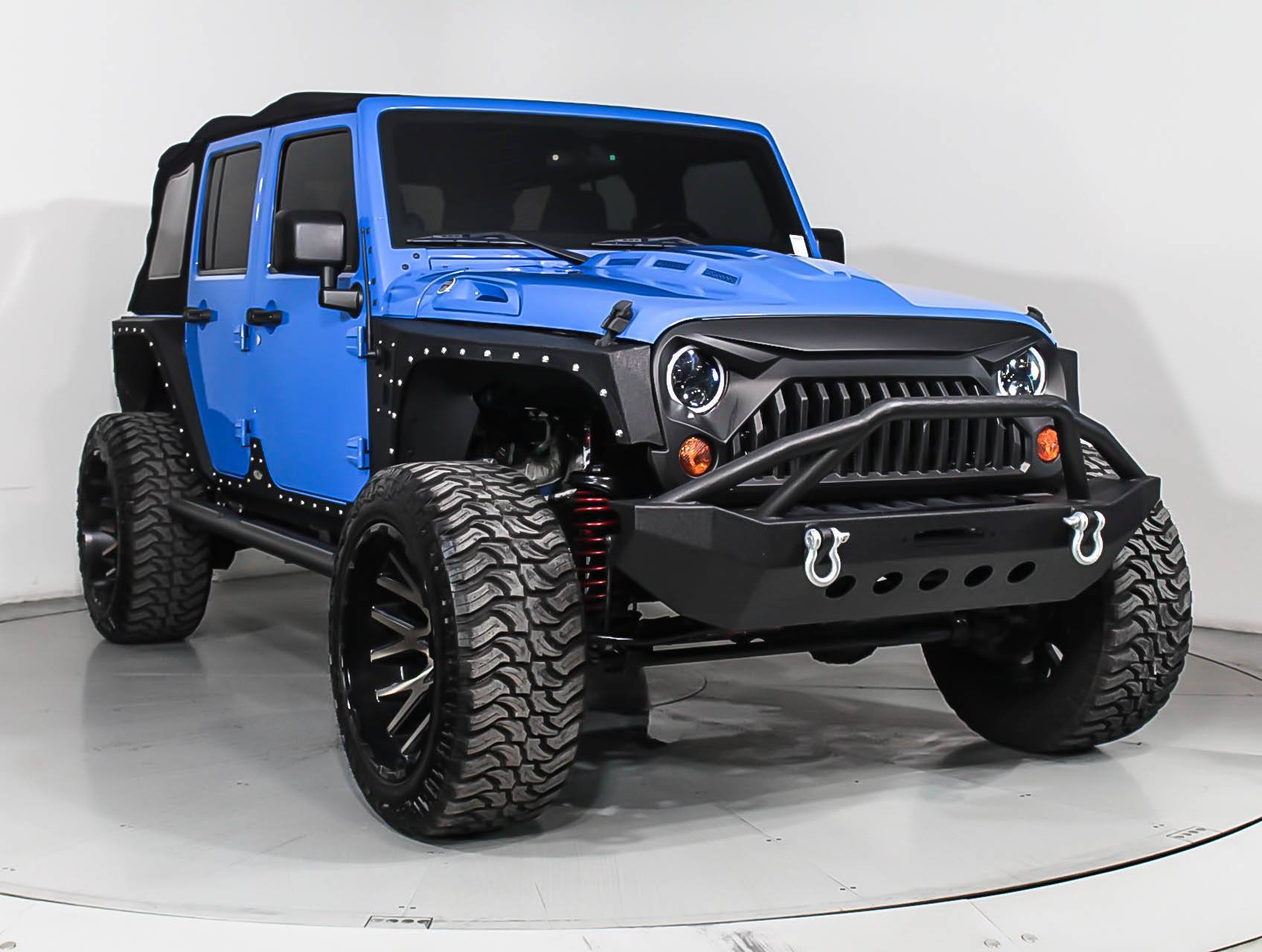 Florida Fine Cars - Used JEEP WRANGLER UNLIMITED 2012 MIAMI SAHARA