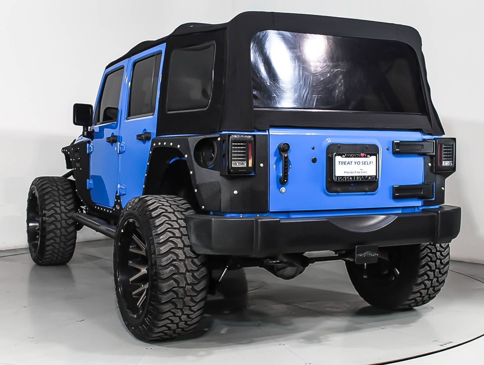 Florida Fine Cars - Used JEEP WRANGLER UNLIMITED 2012 MIAMI SAHARA