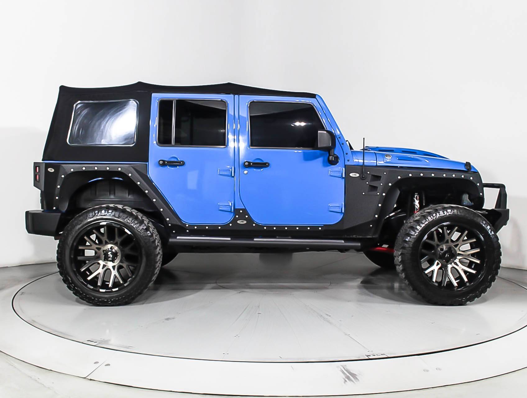 Florida Fine Cars - Used JEEP WRANGLER UNLIMITED 2012 MIAMI SAHARA