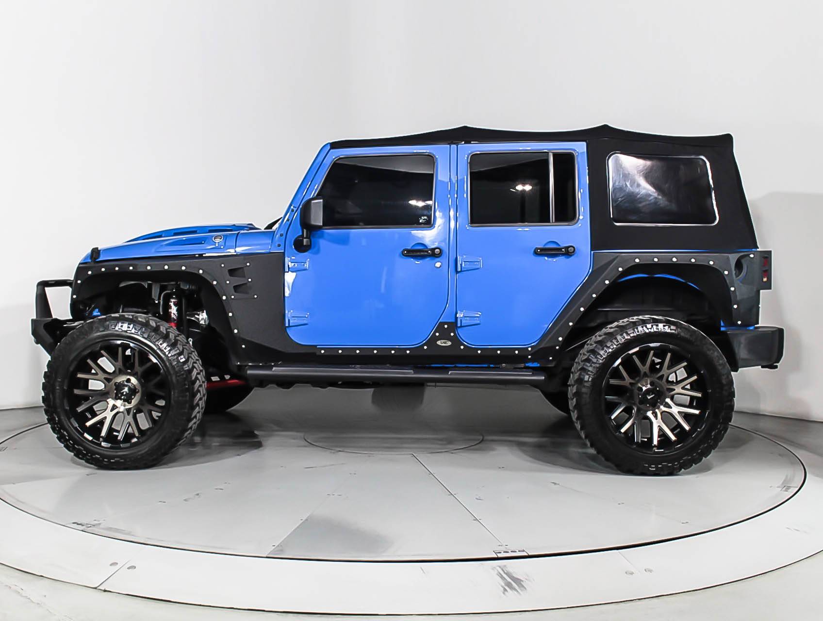 Florida Fine Cars - Used JEEP WRANGLER UNLIMITED 2012 MIAMI SAHARA