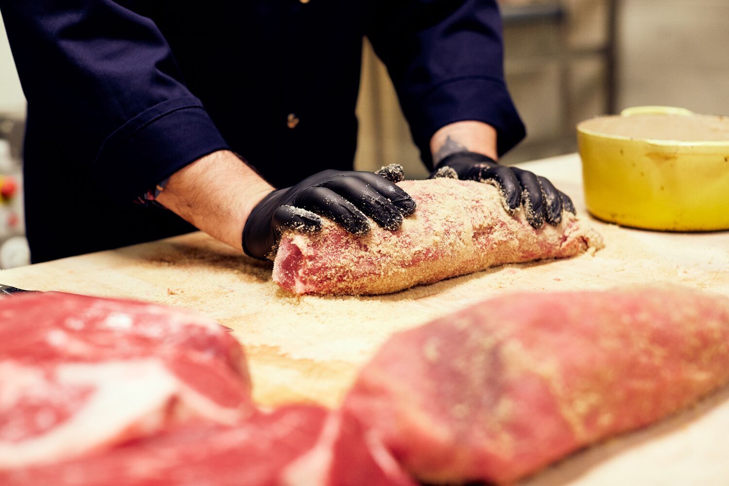Butcher Working with Meat