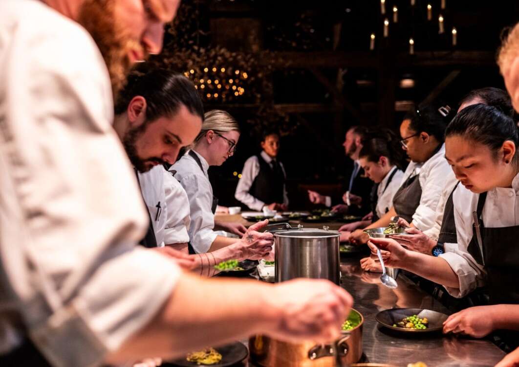Chefs Preparing Dinner Service