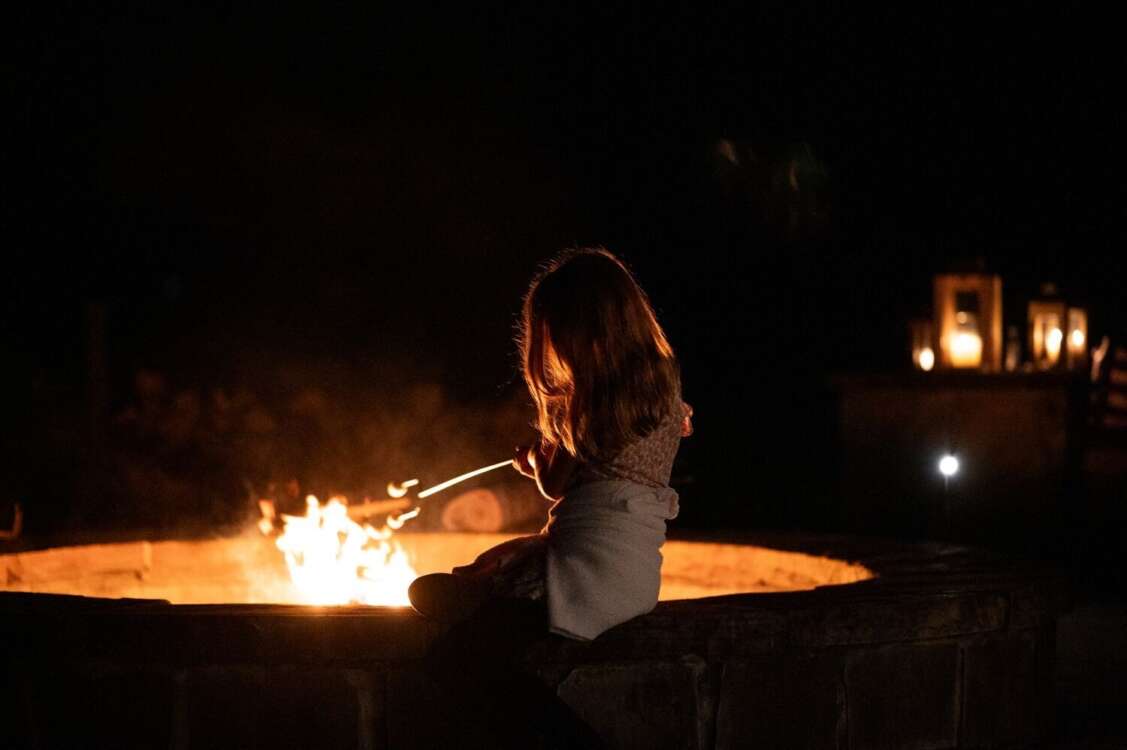 Young Guest Roasting Marshmallows