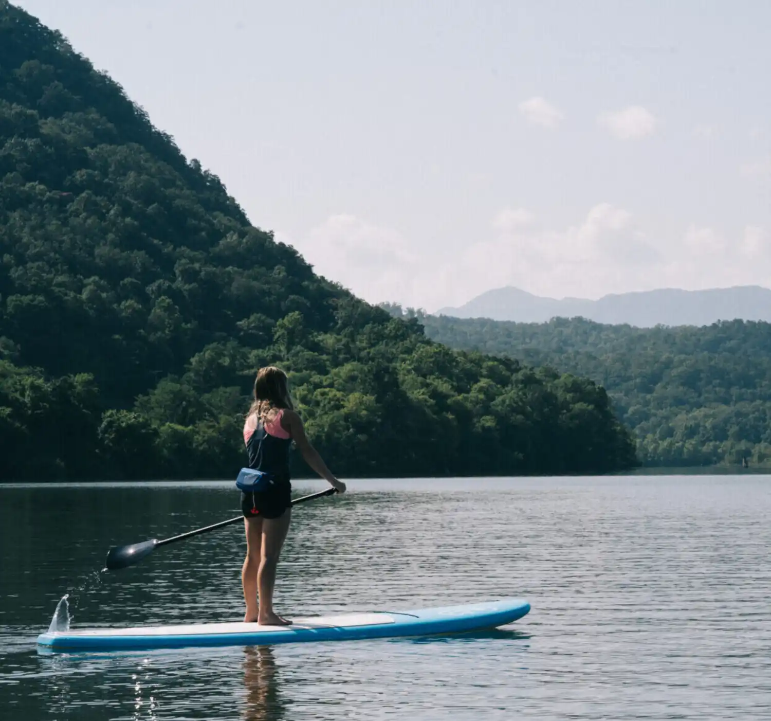 Woman Paddle Boarding