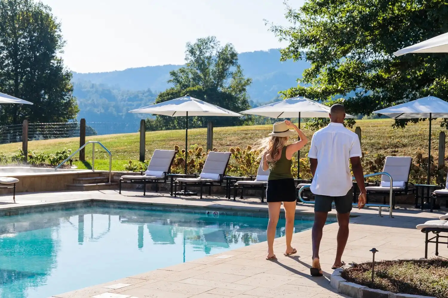 Guests Walking by Wellhouse Pool