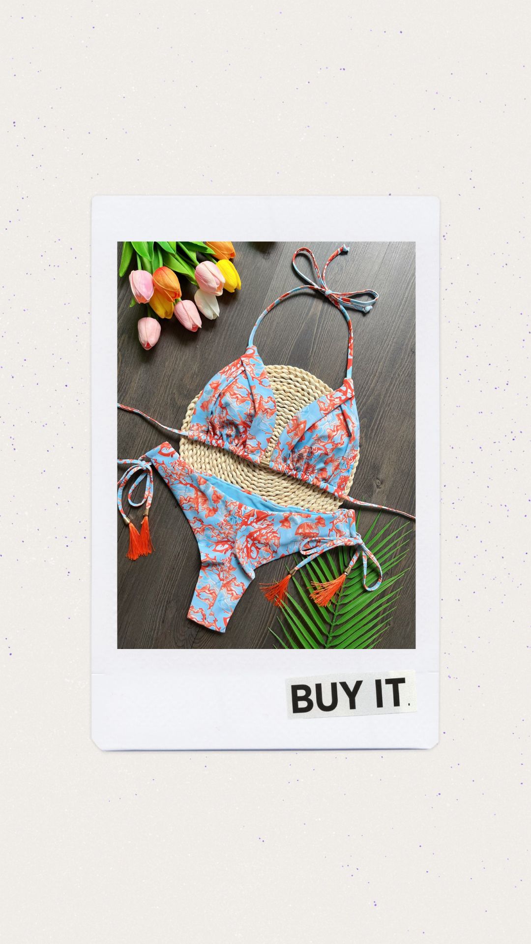 Bikini color celeste con estampado naranja 