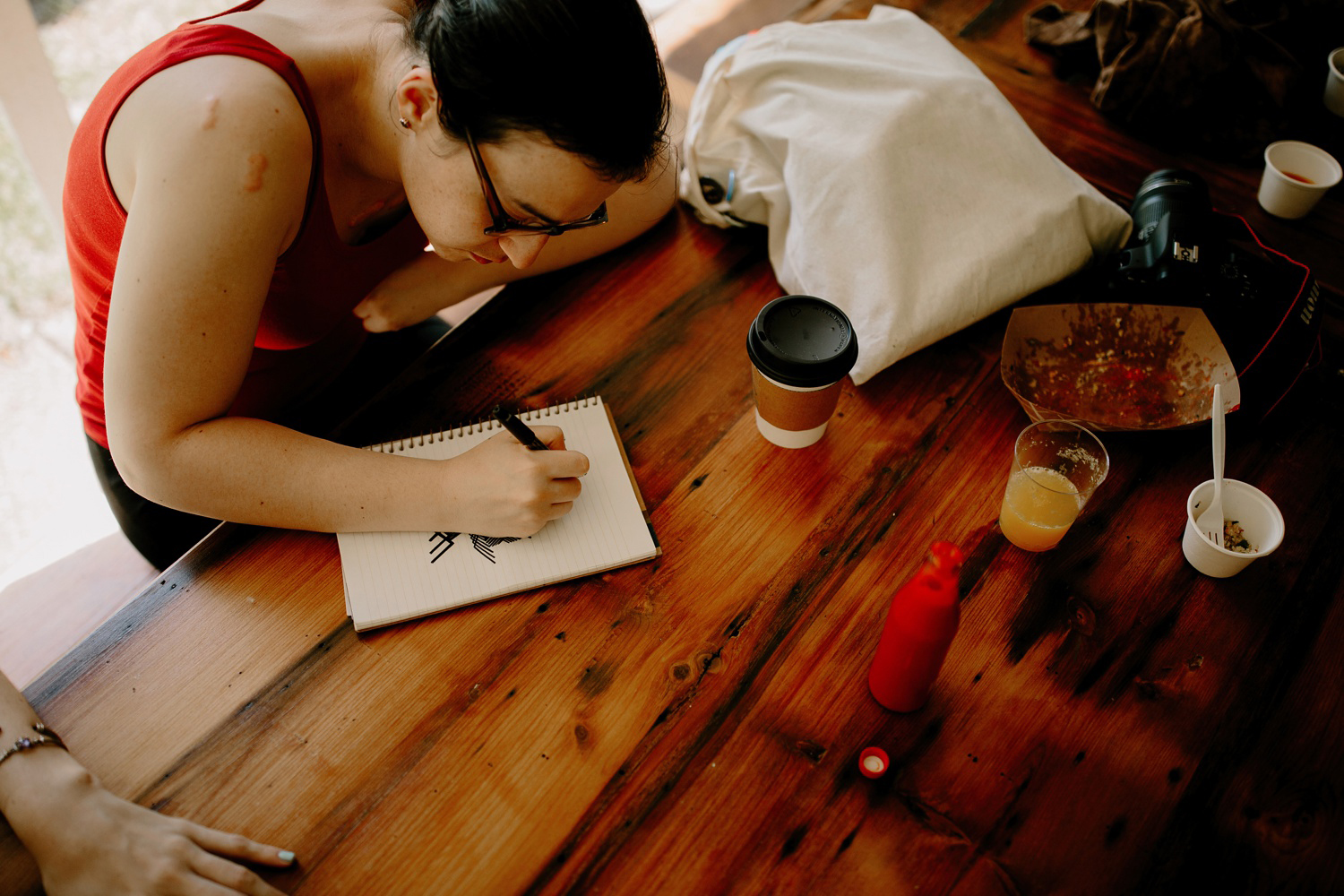 girl drawing at table