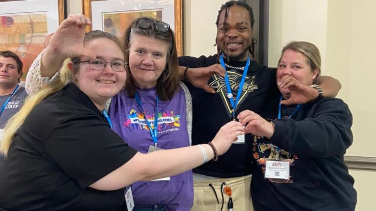 members of the Missouri AfterSchool Network (MASN) team, including Aaron Banks (man in black shirt, center-right) and Mark Cowsert (man in purple shirt, center-left