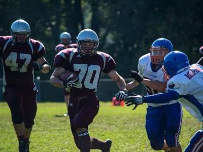 Runningback #70 Carson Reid evades defenders in the Falcons' Thursday win.