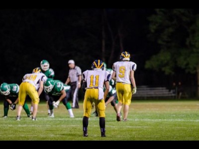 Donovan Brooks Jr. (11) lines up before the play