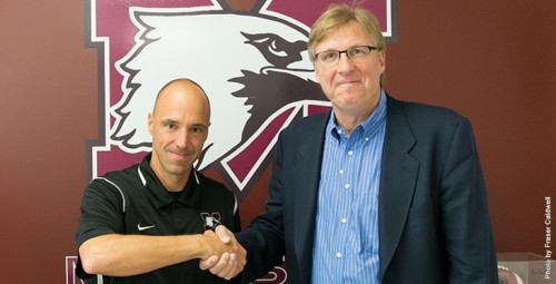 McMaster Marauders Head Coach Stefan Ptaszek shakes hands with Director of Athletics and Recreation Glen Grunwald