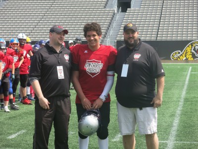 Joshua Mascoll-Mederois with Gary Gerard (left) and Shawn McIntyre (right).