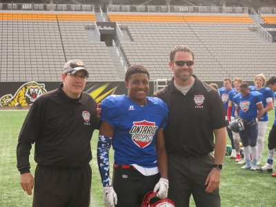 Adre Simmonds (#3) with Larry Bone (left) and Len Gurr (right).