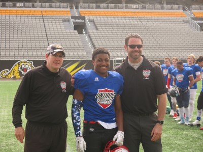 Adre Simmonds (#3) with Larry Bone (left) and Len Gurr (right). 