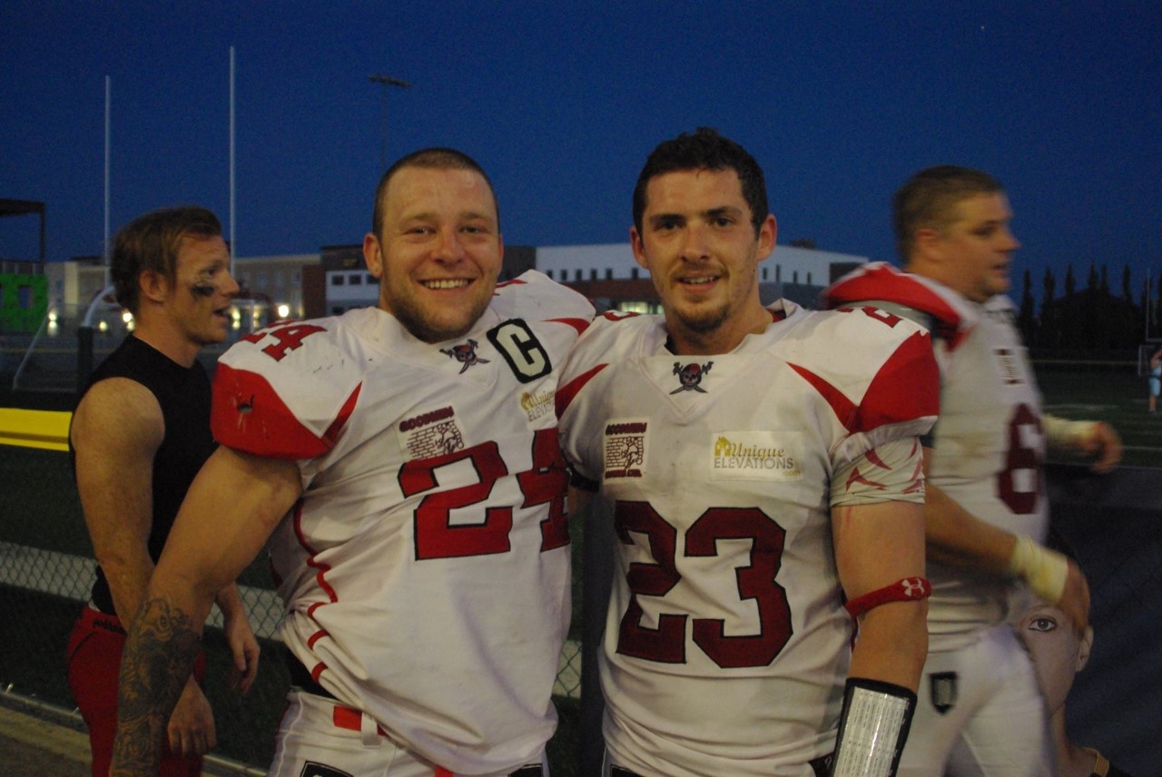 Ryan Miller (23) and Nick Leonidakis (24) celebrate big win