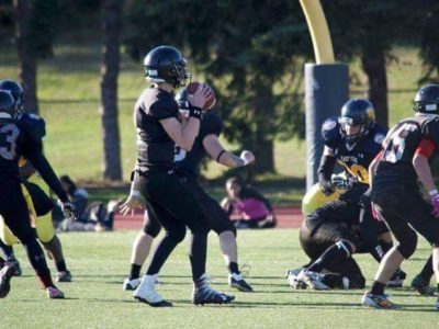 Jack Ryan (#2) scans the field during a game