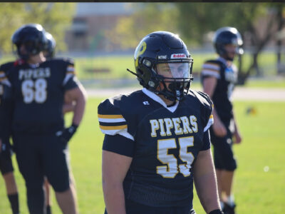 CFC Camp Spotlight: John Taylor OL Ezinicki built on accountability and edge