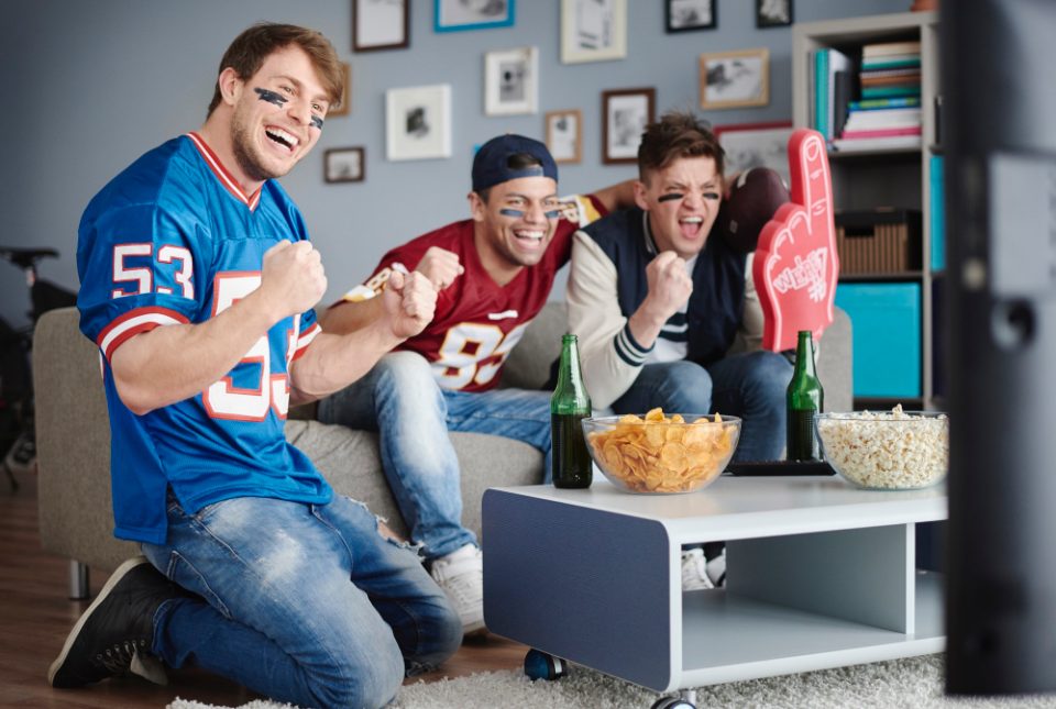 group friends watching football. Chati supports virtual events for Sports