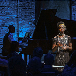 Performance photo from Studio Sessions: Soul & Sound 2.0, featuring a vocalist onstage with piano accompaniment.