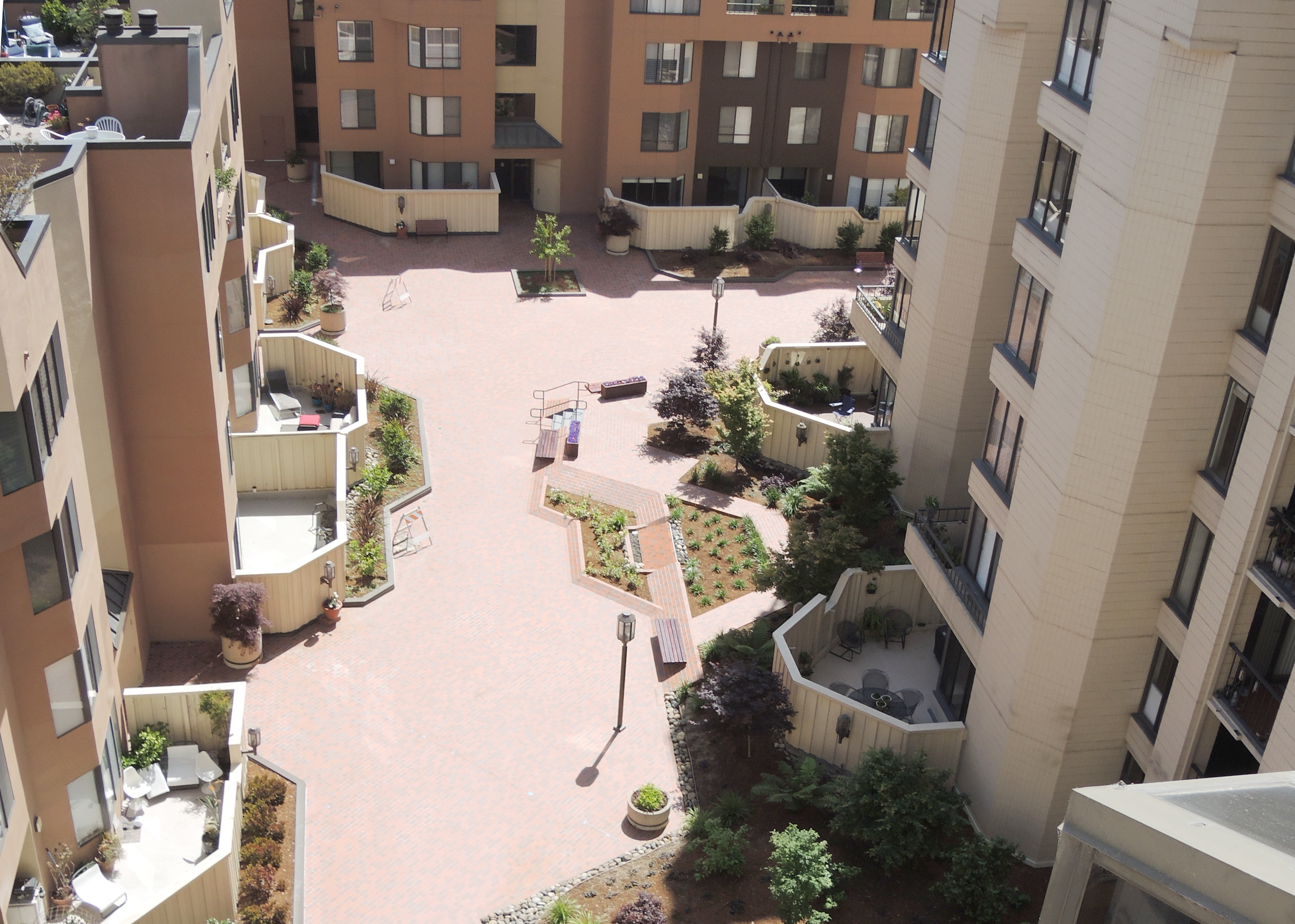 In this professional portrait, Bill Gibson, an expert from Engineered Soil Repairs Inc., is pictured standing confidently against a neutral background. Wearing a blue checkered shirt and eyeglasses, Bill embodies a knowledgeable and approachable presence in the field of soil stabilization and repair. His experience and expertise contribute significantly to innovative solutions for soil-related challenges in construction and infrastructure projects.