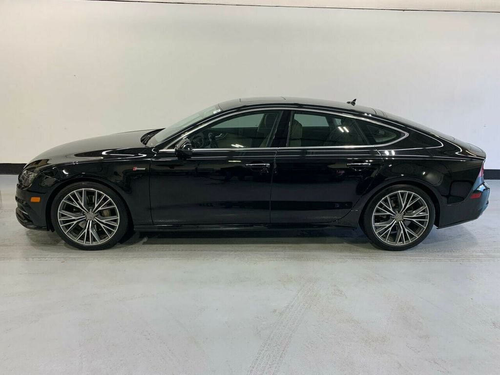 Used 2017 Audi A7 Premium Plus with VIN WAUW2AFC1HN069447 for sale in Golden Valley, Minnesota