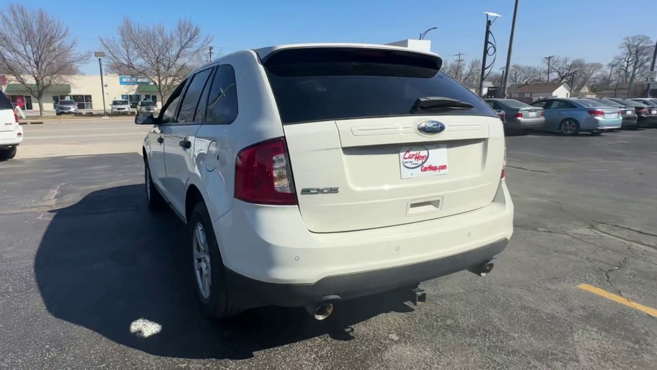 PreOwned 2012 FORD EDGE SE Sport U 4D SUV X449322 in Council Bluffs