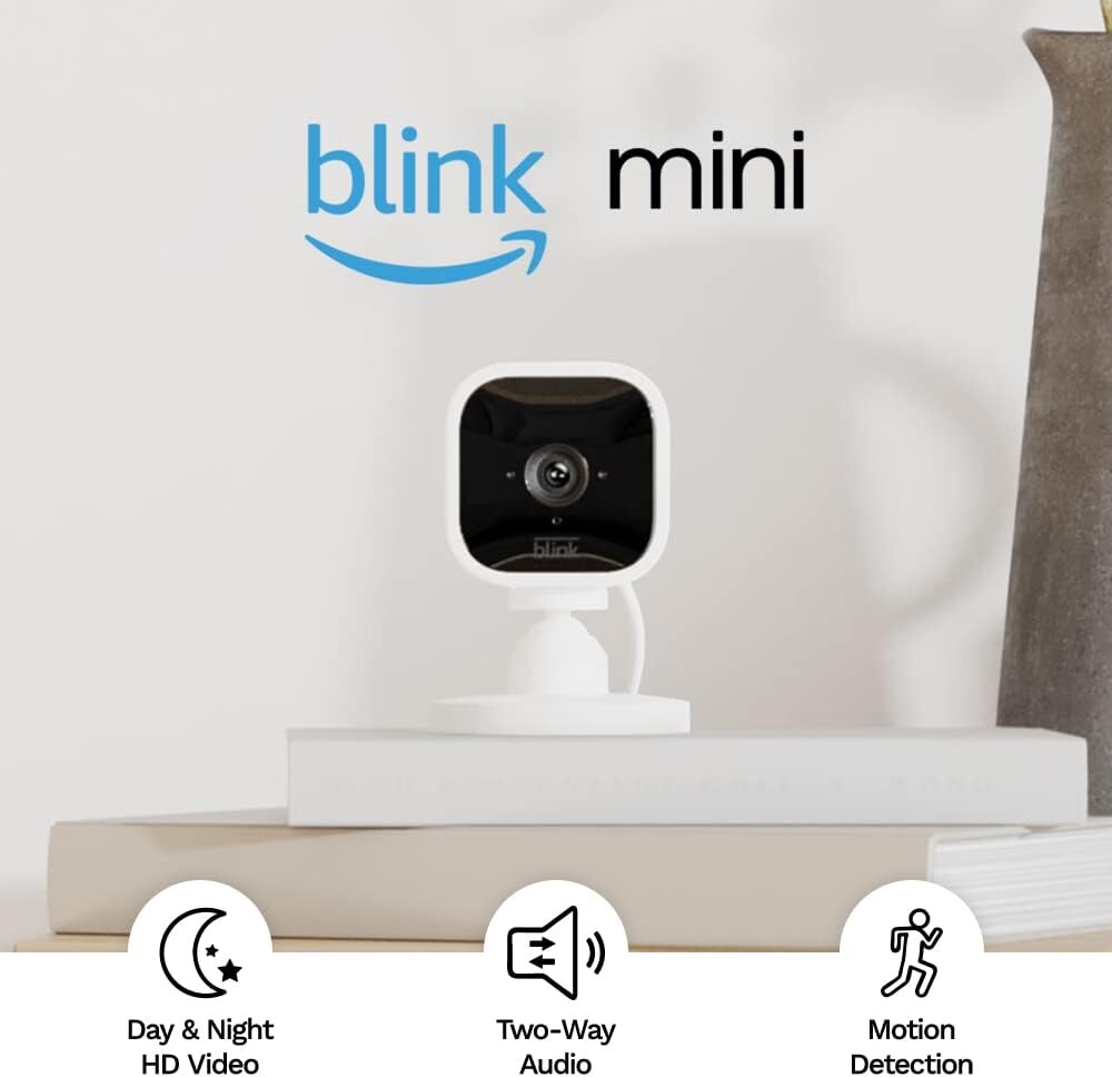 Blink Mini - Compact indoor plug-in smart security camera, 1080p HD video, night vision, motion detection, two-way audio, easy set up, Works with Alexa – 4 cameras (White)