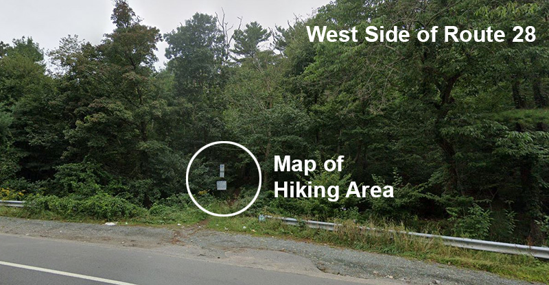 Figure 4: Skyline Trail Entrances. This figure includes two pictures, one of the west side of Route 28 and the other of the east side of the roadway. The picture of the west side of Route 28 highlights the map of the hiking area located on that side of the roadway. The picture of the east side of Route 28 includes a sign illustrating a hiker, accompanied by an arrow sign.