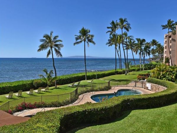Oceanfront Charming Vacation Condo Sleeps Four Guests