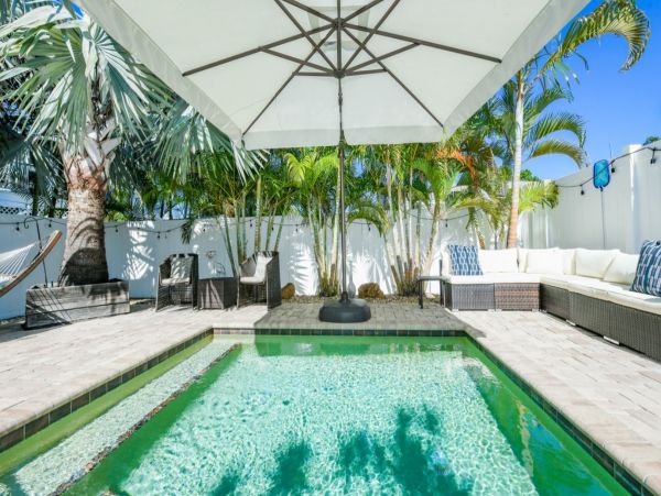 Four Bedroom Vacation Home with Pool and Short Walk to Beach