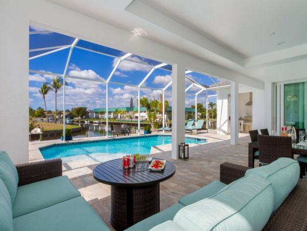 Canal-Front Vacation Home with Pool and Boat Dock 8 Guests