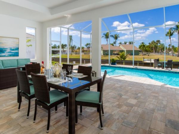 Canal-Front Vacation Home with Pool and Boat Dock 8 Guests