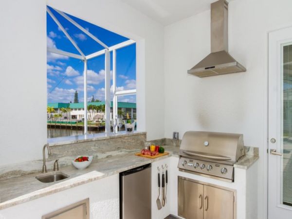Canal-Front Vacation Home with Pool and Boat Dock 8 Guests