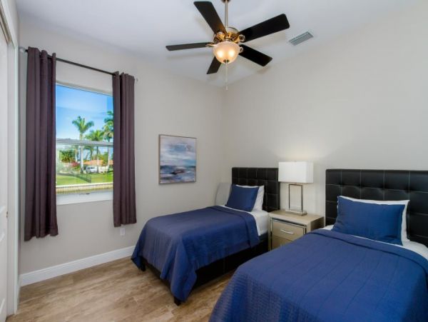 Canal-Front Vacation Home with Pool and Boat Dock 8 Guests