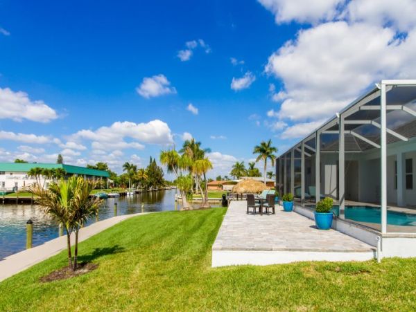 Canal-Front Vacation Home with Pool and Boat Dock 8 Guests