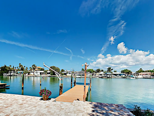 Indian Rocks FL Colorful Beach Home with Canal Front Pool