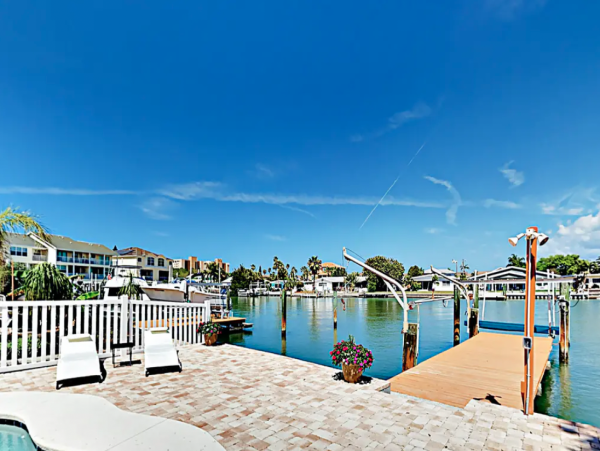 Indian Rocks FL Colorful Beach Home with Canal Front Pool