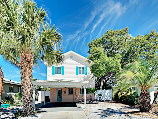 Indian Rocks FL Colorful Beach Home with Canal Front Pool