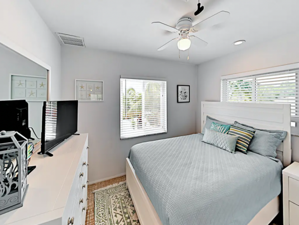 Indian Rocks FL Colorful Beach Home with Canal Front Pool