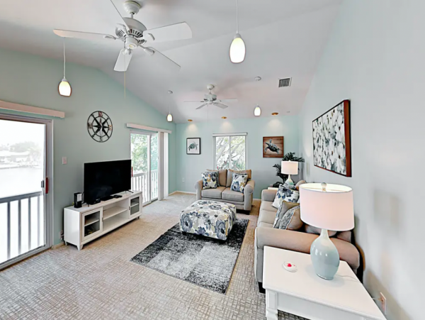 Indian Rocks FL Colorful Beach Home with Canal Front Pool