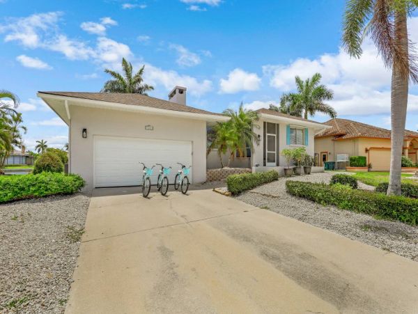 Marco Island Vacation Rental with Caged Pool and Boat Dock