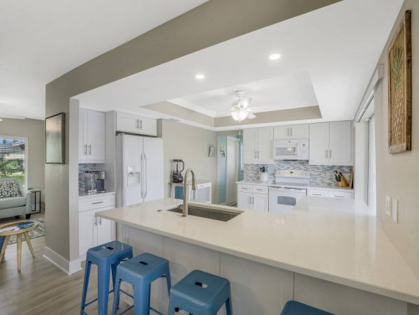 Marco Island Vacation Rental with Caged Pool and Boat Dock