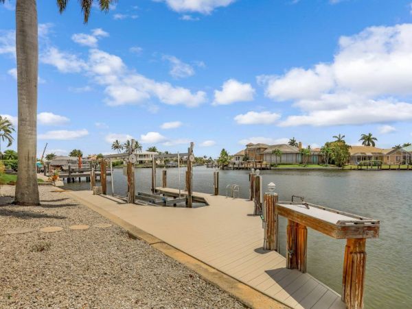 Marco Island Vacation Rental with Caged Pool and Boat Dock