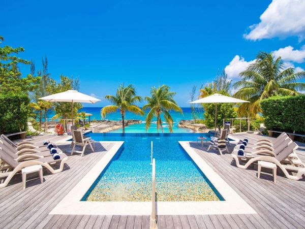 Enjoy the Barefoot Sandy Beach Out Front South of Seven Mile Beach