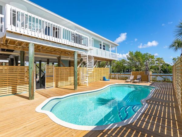 Coastal Vacation Home in Palm Island with Pool & Boat Dock