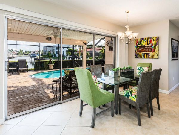 Tropical Island Escape: Spacious 5-Bedroom, 4-Bethroom Home with Pool and Canal Views