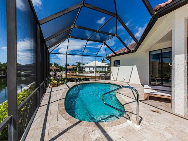 Marco Island Vacation Home with Caged Pool & Boat Dock